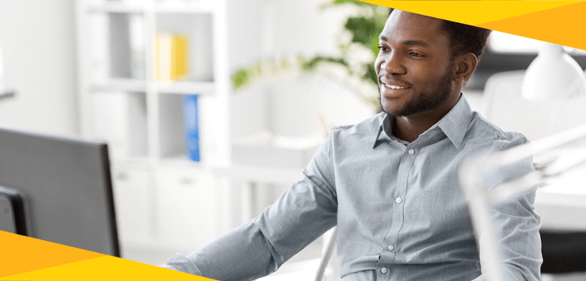 A black man getting his Linux certification in the USA through Yellow Tail Tech’s online program